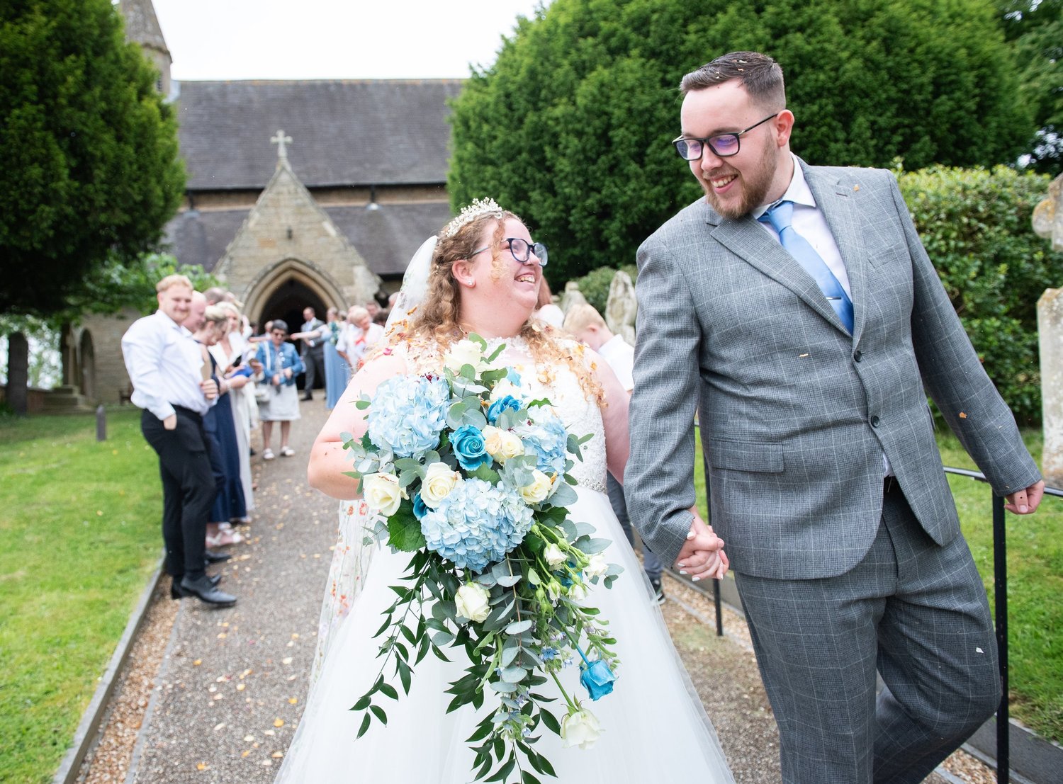 Newlyweds leaving a church